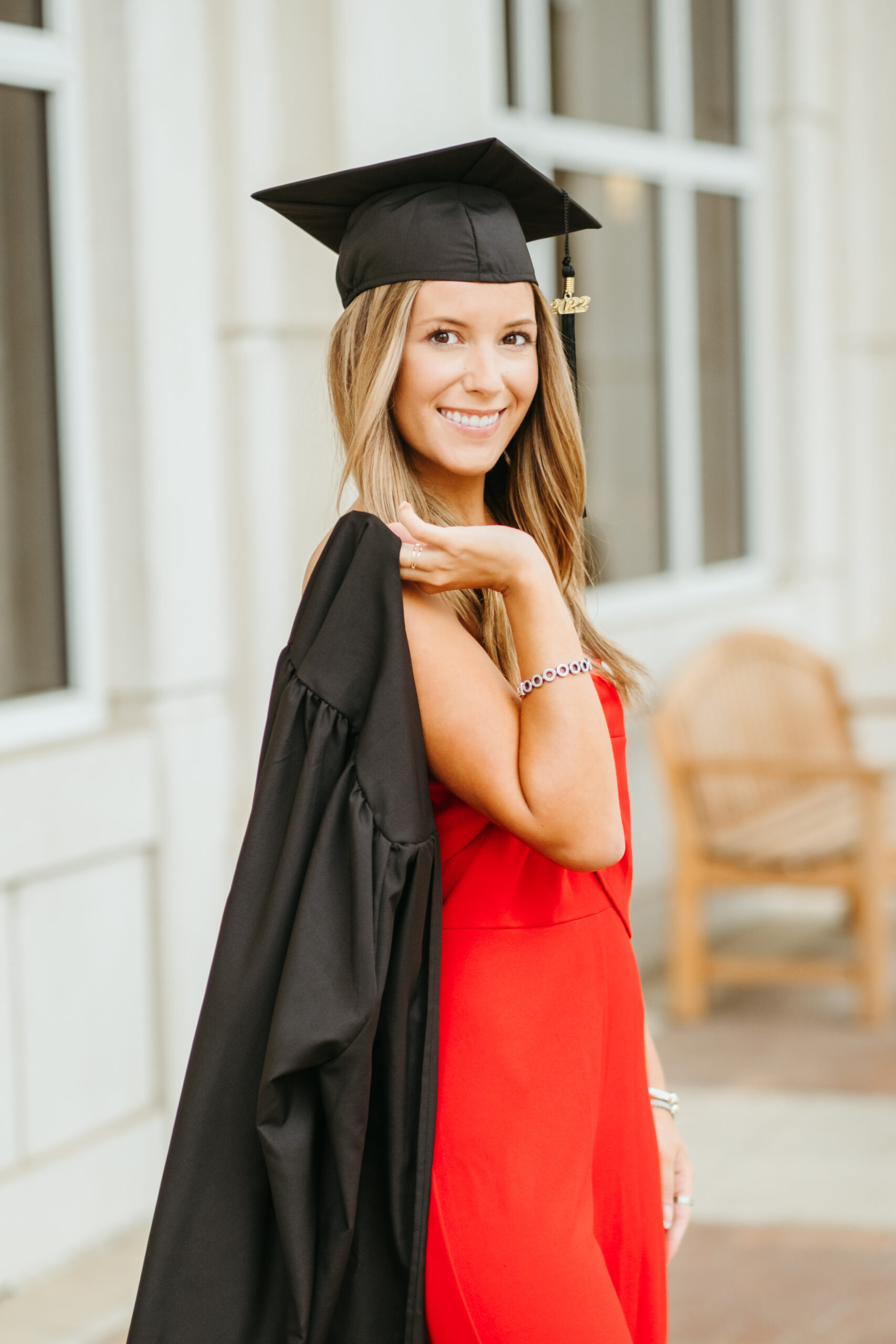 NWA Senior in cap and gown photos at the University of Arkansas campus.